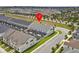 Aerial view of a residential community, showcasing the property's location within a neighborhood at 1632 Tropical Palms Circle, Kissimmee, FL 34747