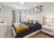 Inviting bedroom features stylish decor, a comfortable bed, and matching nightstands at 1632 Tropical Palms Circle, Kissimmee, FL 34747