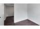 Bedroom space with hardwood floors and access to another room at 1701 E Bay St, Winter Garden, FL 34787