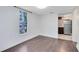 Bedroom featuring a window and view into the kitchen at 1701 E Bay St, Winter Garden, FL 34787