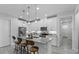 Modern kitchen featuring granite countertops, stainless steel appliances, and a breakfast bar at 18743 Overton St, Orlando, FL 32833