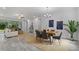 Open concept living and dining area with neutral tones and lots of natural light at 18743 Overton St, Orlando, FL 32833