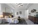 Calm main bedroom with a tray ceiling, neutral colors, carpet, and natural light at 18743 Overton St, Orlando, FL 32833