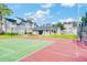 Community basketball court next to green space and condo buildings at 2216 Stonington Ave # 2216, Orlando, FL 32817