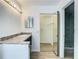Modern bathroom with vanity, a closet, and a walk-in shower at 2216 Stonington Ave # 2216, Orlando, FL 32817