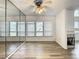 Bright living room featuring laminate flooring, fireplace and ceiling fan at 2216 Stonington Ave # 2216, Orlando, FL 32817