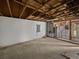 Unfinished basement showing the blank canvas with water heater and walls, ready for renovation at 2226 Newt St, Orlando, FL 32837