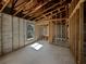 Bedroom framing showing interior wall structure and natural light, ready for customization and design at 2226 Newt St, Orlando, FL 32837