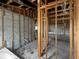 Interior view of home under construction with framing and block walls at 2226 Newt St, Orlando, FL 32837