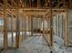 Interior displaying structural framing and arched doorway, showing potential for a unique home layout at 2226 Newt St, Orlando, FL 32837