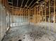Interior view of home under construction with framing, block walls, and exposed ceiling at 2226 Newt St, Orlando, FL 32837