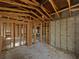 Interior framing with exposed ceiling and concrete floors, ready for your custom design and renovation at 2226 Newt St, Orlando, FL 32837