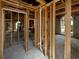 Home interior showing exposed ceiling and framing, awaiting renovation and your personalized touch at 2226 Newt St, Orlando, FL 32837