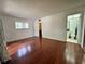 Large bedroom featuring hardwood floors, natural light and adjacent bathroom at 2349 Oak Park Way # 107, Orlando, FL 32822