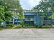 Inviting two-story condo with screened-in balconies and well-maintained landscaping at 2349 Oak Park Way # 107, Orlando, FL 32822