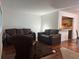 Inviting living room with hardwood floors and neutral paint at 2349 Oak Park Way # 107, Orlando, FL 32822