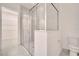 Bright bathroom showcases a glass enclosed shower and walk-in closet at 2362 Datura Loop, St Cloud, FL 34772