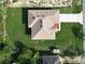 Aerial view of a home with a well-manicured lawn and a long driveway at 2531 Sw 167Th Loop, Ocala, FL 34473
