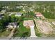 Aerial view of a well-placed home with a pristine lawn and beautiful landscaping at 2531 Sw 167Th Loop, Ocala, FL 34473