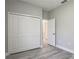 Bedroom with carpeted floors and a large closet at 2531 Sw 167Th Loop, Ocala, FL 34473