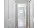 Hallway with doors leading to the bedrooms and bathrooms at 2531 Sw 167Th Loop, Ocala, FL 34473