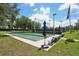 Enjoy leisurely games at the community bocce ball court, surrounded by lush landscaping and benches at 26609 Bull Run, Leesburg, FL 34748