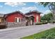 Community Activity Center with a stone base, colorful exterior, and welcoming entrance at 26609 Bull Run, Leesburg, FL 34748