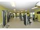 Well-equipped fitness center with various weight machines and cardio equipment at 3150 Paradox Cir # 102, Kissimmee, FL 34746