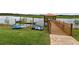 Community kayak dock and launch with various kayaks and a gazebo on the lake at 3150 Paradox Cir # 102, Kissimmee, FL 34746