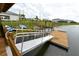 Kayak launch ramp, with kayaks on the adjacent shore, offers residents direct water access from the community at 3150 Paradox Cir # 102, Kissimmee, FL 34746