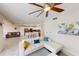 Bright, open-concept living room and kitchen featuring stylish furnishings and modern finishes at 3150 Paradox Cir # 102, Kissimmee, FL 34746