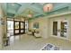 Welcoming lobby featuring tile flooring, stylish decor, and comfortable seating area at 3150 Paradox Cir # 102, Kissimmee, FL 34746