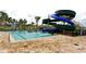 Fun pool area with water slides, shallow areas, and plenty of space for recreation at 3150 Paradox Cir # 102, Kissimmee, FL 34746