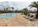 Interactive splash pad area with playful water features and lounge seating at 3150 Paradox Cir # 102, Kissimmee, FL 34746