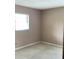 Empty carpeted bedroom with natural light from window at 3152 Clewiston St, Deltona, FL 32738