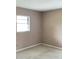 Carpeted bedroom with window allowing natural light to fill the room at 3152 Clewiston St, Deltona, FL 32738