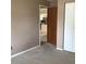 Bedroom with doors leading to other parts of the home at 3152 Clewiston St, Deltona, FL 32738