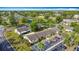 Aerial view of the community featuring well-maintained landscaping, ample parking, and various community facilities at 3208 W Tower Ct, Kissimmee, FL 34741