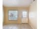This room has neutral-colored walls, a standard window offering natural light, and convenient electrical outlets at 3208 W Tower Ct, Kissimmee, FL 34741