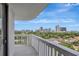 A condo balcony overlooks the city skyline with open and unobstructed views at 400 E Colonial Dr # 1202, Orlando, FL 32803