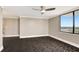 Bright bedroom with a large window offering beautiful views and plenty of natural light at 400 E Colonial Dr # 1202, Orlando, FL 32803