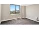 Bright bedroom features a large window offering beautiful city views and plenty of natural light at 400 E Colonial Dr # 1202, Orlando, FL 32803