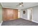 Bedroom with large wardrobe and a mirrored accent, provides ample space for storage and relaxation at 400 E Colonial Dr # 1202, Orlando, FL 32803