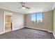 A serene bedroom with an open bathroom entrance features calming colors and scenic views at 400 E Colonial Dr # 1202, Orlando, FL 32803