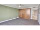 Inviting bedroom features spacious built-in storage and leads to the ensuite bathroom at 400 E Colonial Dr # 1202, Orlando, FL 32803