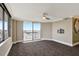 Bright living room with access to a balcony and lovely views at 400 E Colonial Dr # 1202, Orlando, FL 32803