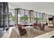 Bright and airy lobby with cozy seating, modern decor, and floor-to-ceiling windows offering beautiful views at 400 E Colonial Dr # 1202, Orlando, FL 32803