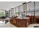 Elegant reception desk in a spacious lobby with large windows providing ample natural light and a welcoming atmosphere at 400 E Colonial Dr # 1202, Orlando, FL 32803