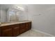 Bathroom featuring dual vanity with granite counters and tiled floors at 405 E Freesia Ct, Deland, FL 32724