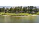 Scenic lakeside community featuring a covered shelter overlooking the waterfront at 405 E Freesia Ct, Deland, FL 32724